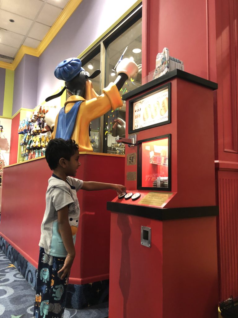 Making himself another character penny in the Disney Store